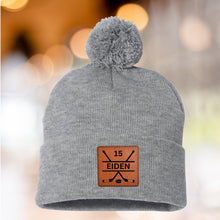 Load image into Gallery viewer, Hockey Mom Beanie Winter Hat Leather Patch Custom Design Sport Team Hockey Mom Gift Idea Winter Wear Warm Accessory Fur Pom Knit Cap Rink