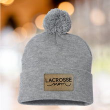 Load image into Gallery viewer, Lacrosse Mom Beanie Winter Hat Leather Patch Mom Gift Lacrosse Fan Winter Wear Warm Beanie Pom Top Cold Weather Field Accessory Team Mom