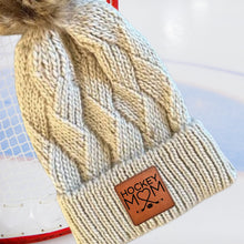 Load image into Gallery viewer, Hockey Mom Beanie Winter Hat Leather Patch Mom Gift Hockey Fan Winter Wear Warm Beanie Pom Top Cold Weather Rink Accessory Team Mom Sport