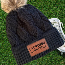 Load image into Gallery viewer, Lacrosse Mom Beanie Winter Hat Leather Patch Mom Gift Lacrosse Fan Winter Wear Warm Beanie Pom Top Cold Weather Field Accessory Team Mom
