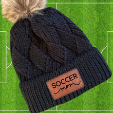 Load image into Gallery viewer, Soccer Mom Beanie Winter Hat Leather Patch Mom Gift Soccer Fan Winter Wear Warm Beanie Pom Top Cold Weather Field Accessory Team Mom Sport