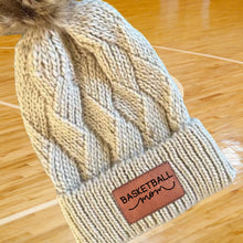Load image into Gallery viewer, Basketball Mom Beanie Winter Hat Leather Patch Mom Gift Basketball Fan Winter Wear Warm Beanie Pom Top Cold Weather Accessory Team Mom Sport