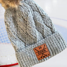 Load image into Gallery viewer, Hockey Mom Beanie Winter Hat Leather Patch Custom Design Sport Team Hockey Mom Gift Idea Winter Wear Warm Accessory Fur Pom Knit Cap Rink